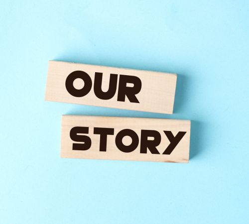 Wooden blocks spelling Our Story