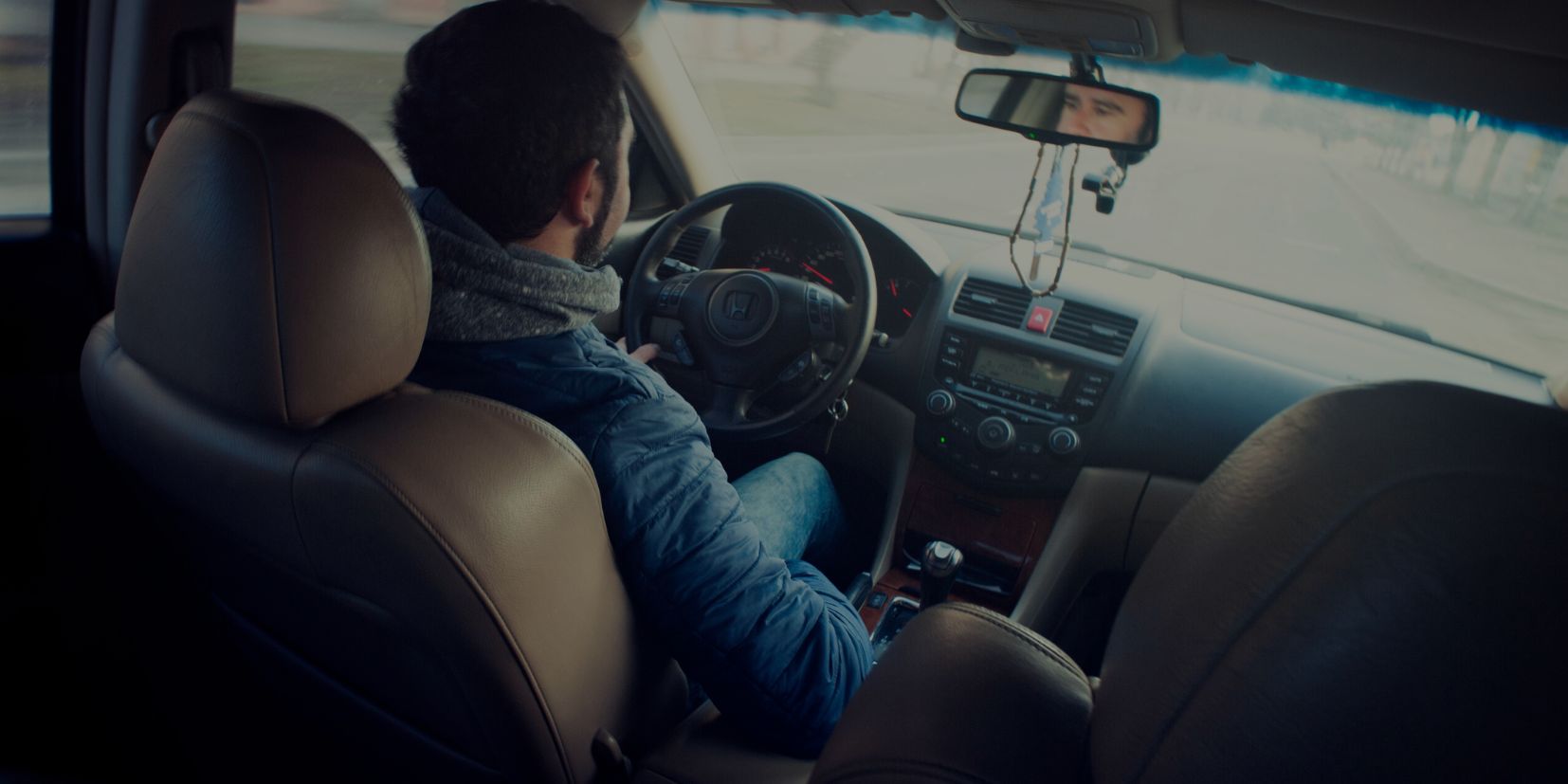 Driver at the wheel of a car